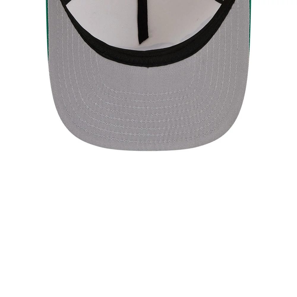 Boston Celtics NBA Cream New Era 9FIFTY A-Frame Snapback Adjustable Cap, inside view showing the grey undervisor, black sweatband, white inner lining, and black taping, providing a glimpse of the construction details.