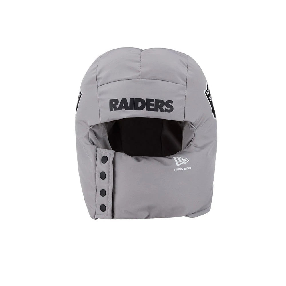 Pictured is this NFL Puffer Helmet Las Vegas Raiders Trapper hat in Grey. 2