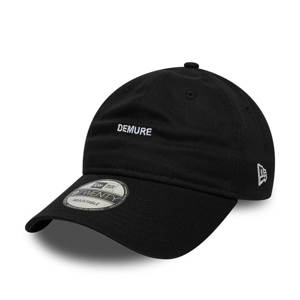 This is a New Era Slogan Demure Black 9TWENTY Adjustable Cap 1