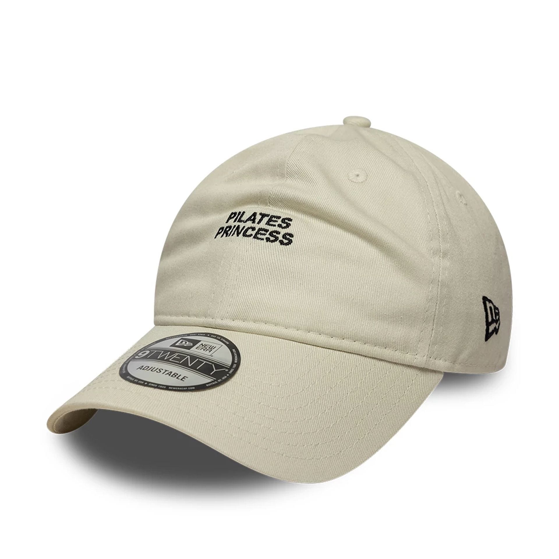 This is a New Era Slogan Pilates Princess Light Beige 9TWENTY Adjustable Cap 1