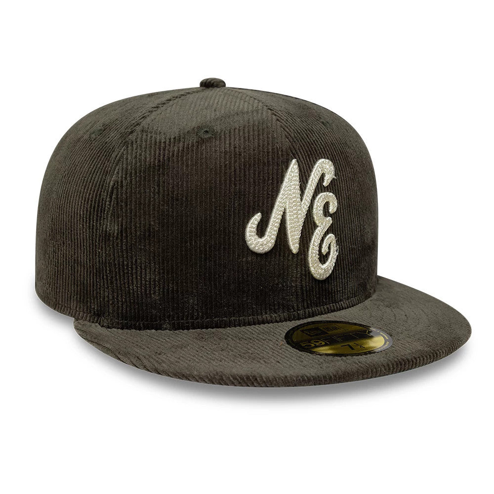 New Era Cord Dark Green 59FIFTY Fitted Cap, three-quarter view showing the raised white embroidered NE logo on the front panel, with a dark green corduroy finish and gold 59FIFTY size sticker on the flat visor.