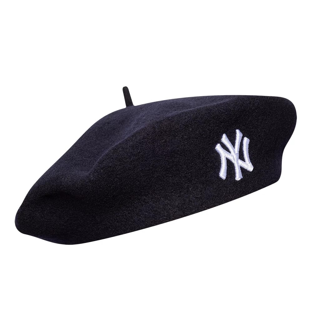 New Era New York Yankees Womens MLB Wool Navy Beret, front view showing the white embroidered NY logo on the navy wool crown with a classic beret silhouette and a small fabric stem on top.