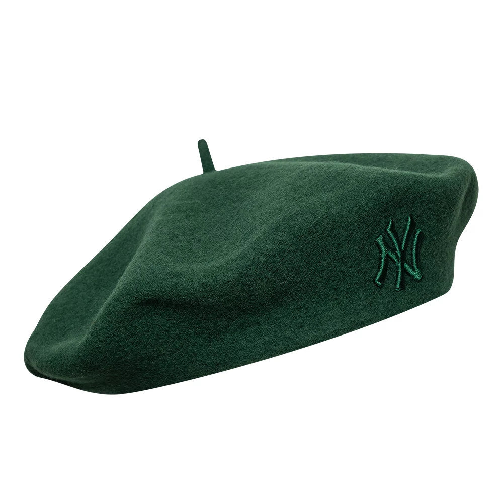 New Era New York Yankees Womens MLB Wool Dark Green Beret, side view showing the embroidered NY logo on the left side, with a soft texture and classic beret design, featuring a small loop on the top.