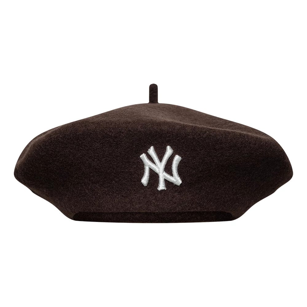 New Era New York Yankees Womens MLB Wool Dark Brown Beret, front view showing the white embroidered NY logo centred on the deep brown wool fabric, with a traditional beret shape featuring a small fabric loop at the top.