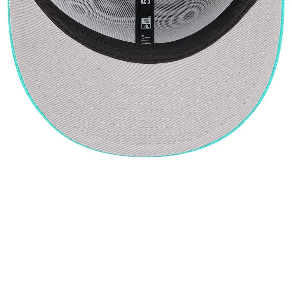 Memphis Grizzlies NBA Classic Black New Era 59FIFTY Fitted Cap, inside view showing the grey undervisor with a teal edge, black headband, and New Era logo on the black taping along the seams.