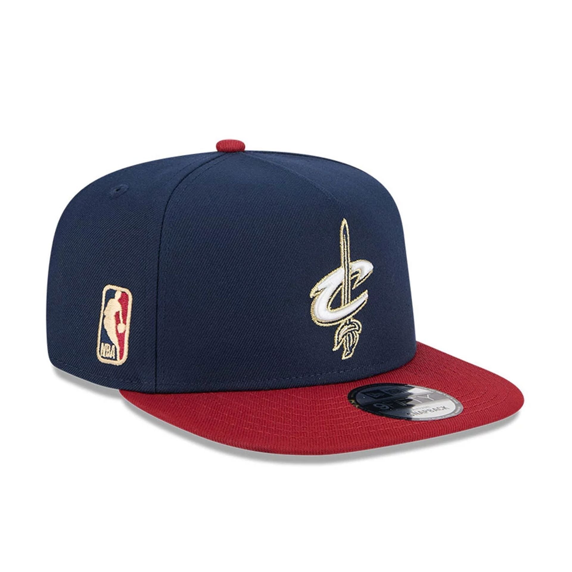 Pictured is this NBA Classic Cleveland Cavaliers 9FIFTY A-Frame Snapback Adjustable cap in dark blue. 1