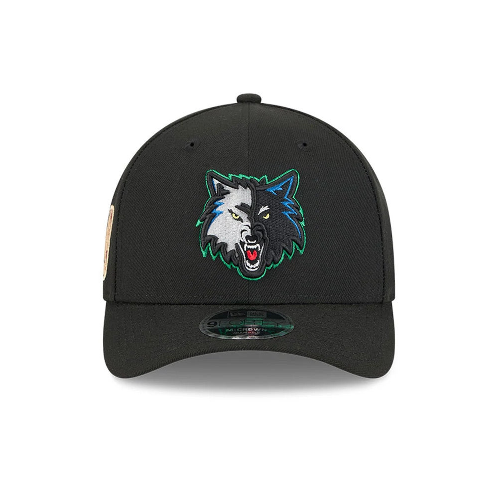 Minnesota Timberwolves NBA Classic Black New Era 9FORTY M-Crown Adjustable Cap, front view showing the detailed embroidered Timberwolves logo on the black front panel and a 9FORTY size sticker on the curved black visor.