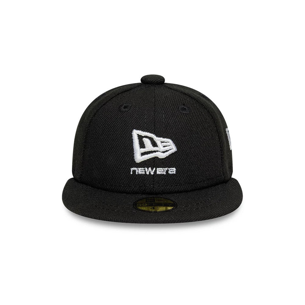 New Era Flag Logo Black Mini 59FIFTY Fitted Cap, front view showing white raised embroidery of the New Era flag logo and text on the structured black crown, with a gold 59FIFTY size sticker on the flat visor.