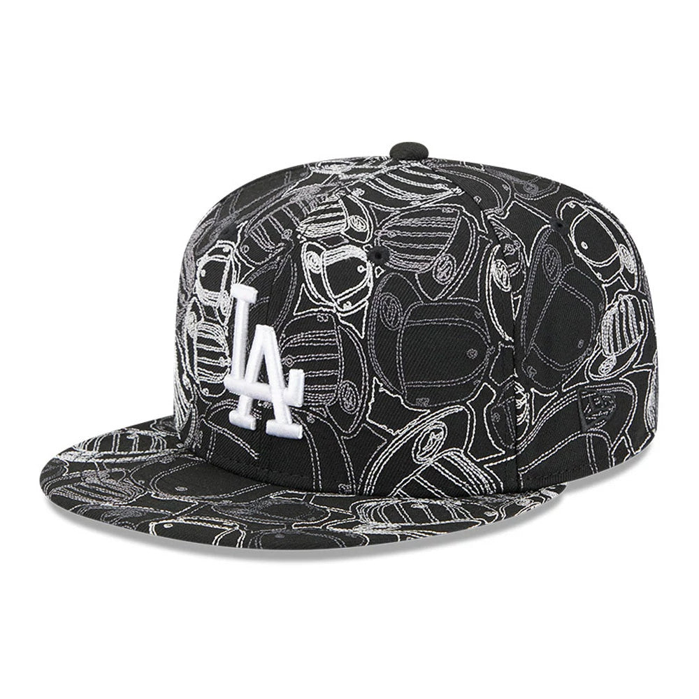 LA Dodgers MLB Cap Scramble Black New Era 59FIFTY Fitted Cap, front view showing the raised white LA logo embroidered on the black crown featuring a white cap scramble pattern, with a flat visor and no size sticker.