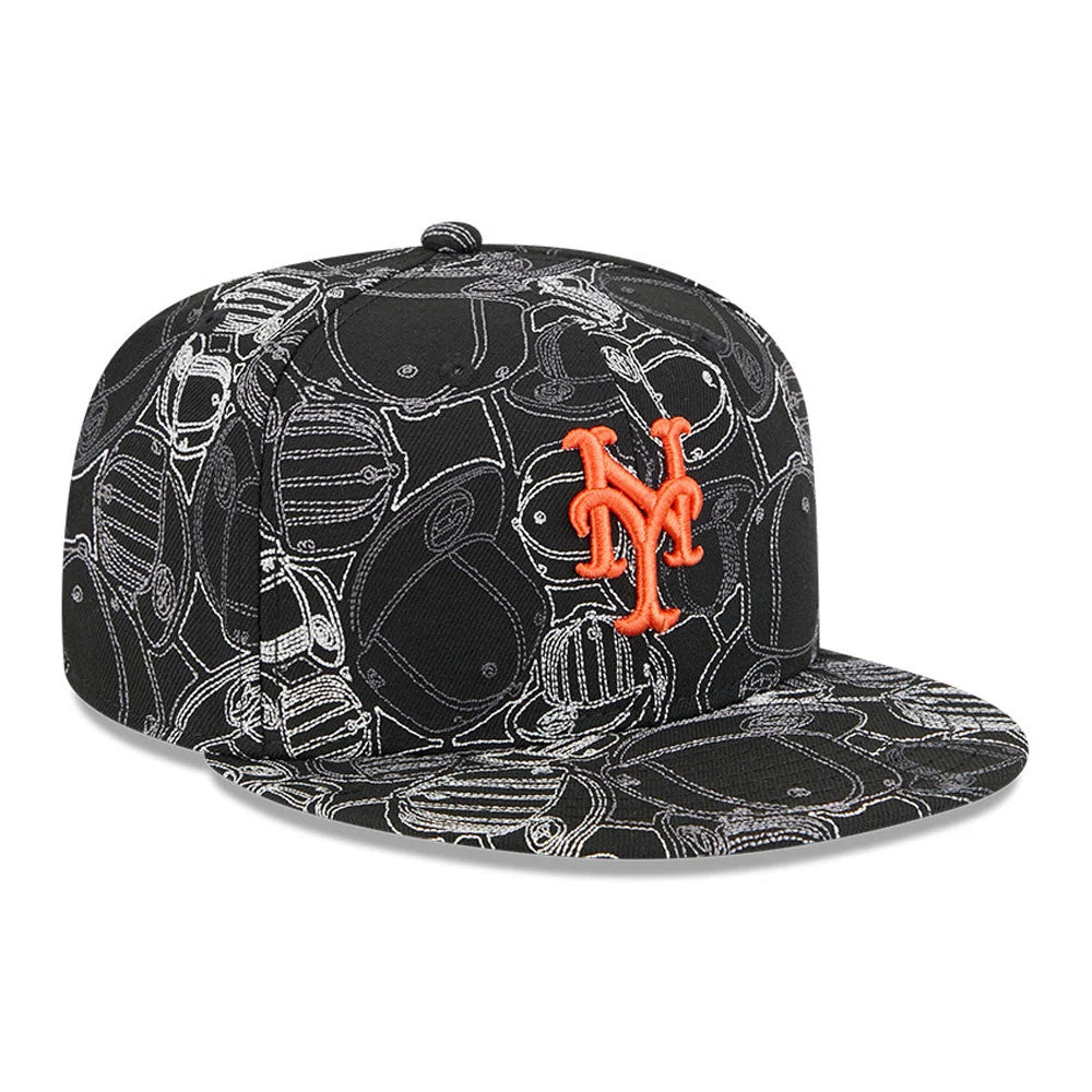 New York Mets MLB Cap Scramble Black New Era 59FIFTY Fitted Cap, front view showing an orange raised embroidered Mets logo on the black crown with a detailed cap pattern, featuring a flat black visor.