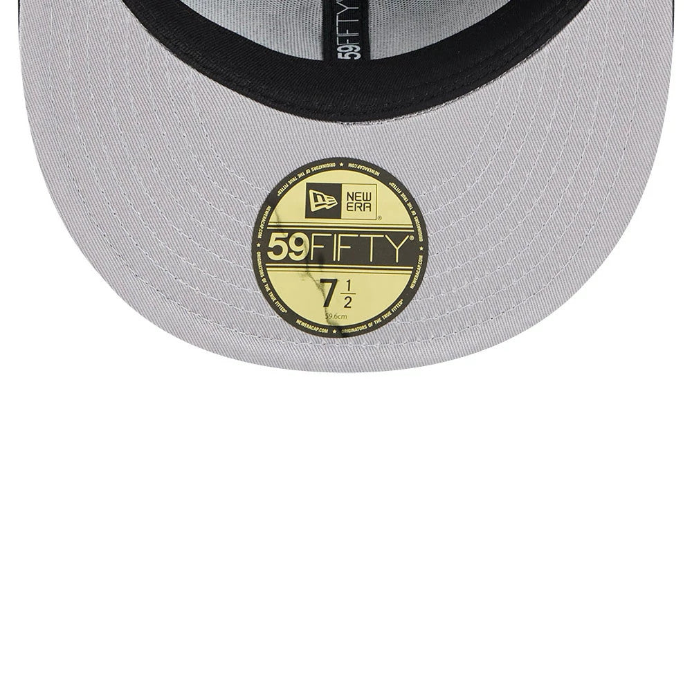 New York Yankees MLB Cap Scramble Black New Era 59FIFTY Fitted Cap, inside view showing the grey undervisor with a gold 59FIFTY size sticker and black taping with 59FIFTY branding along with a black sweatband.