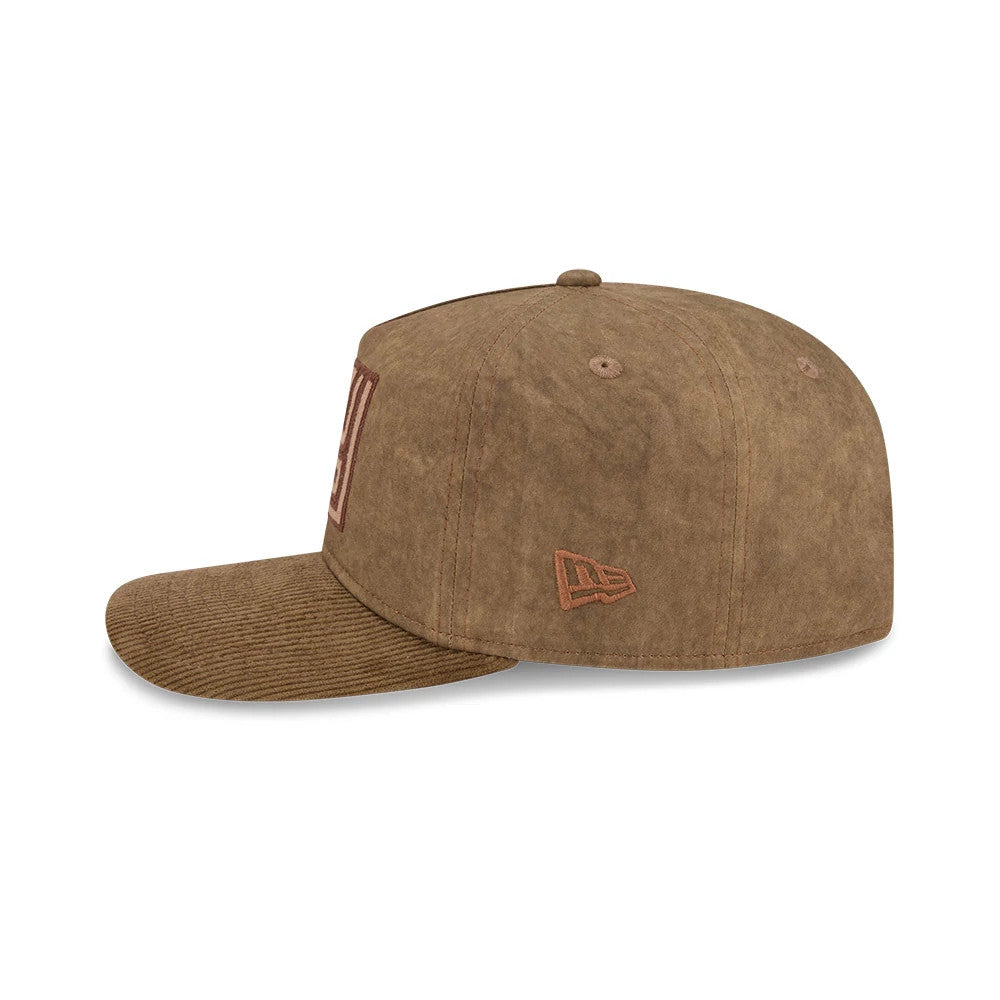 New York Giants NFL Utility Linen Open Brown New Era 19TWENTY Adjustable Cap, side view showing the embroidered New Era flag logo on the left side and the structured brown crown with a corduroy visor.