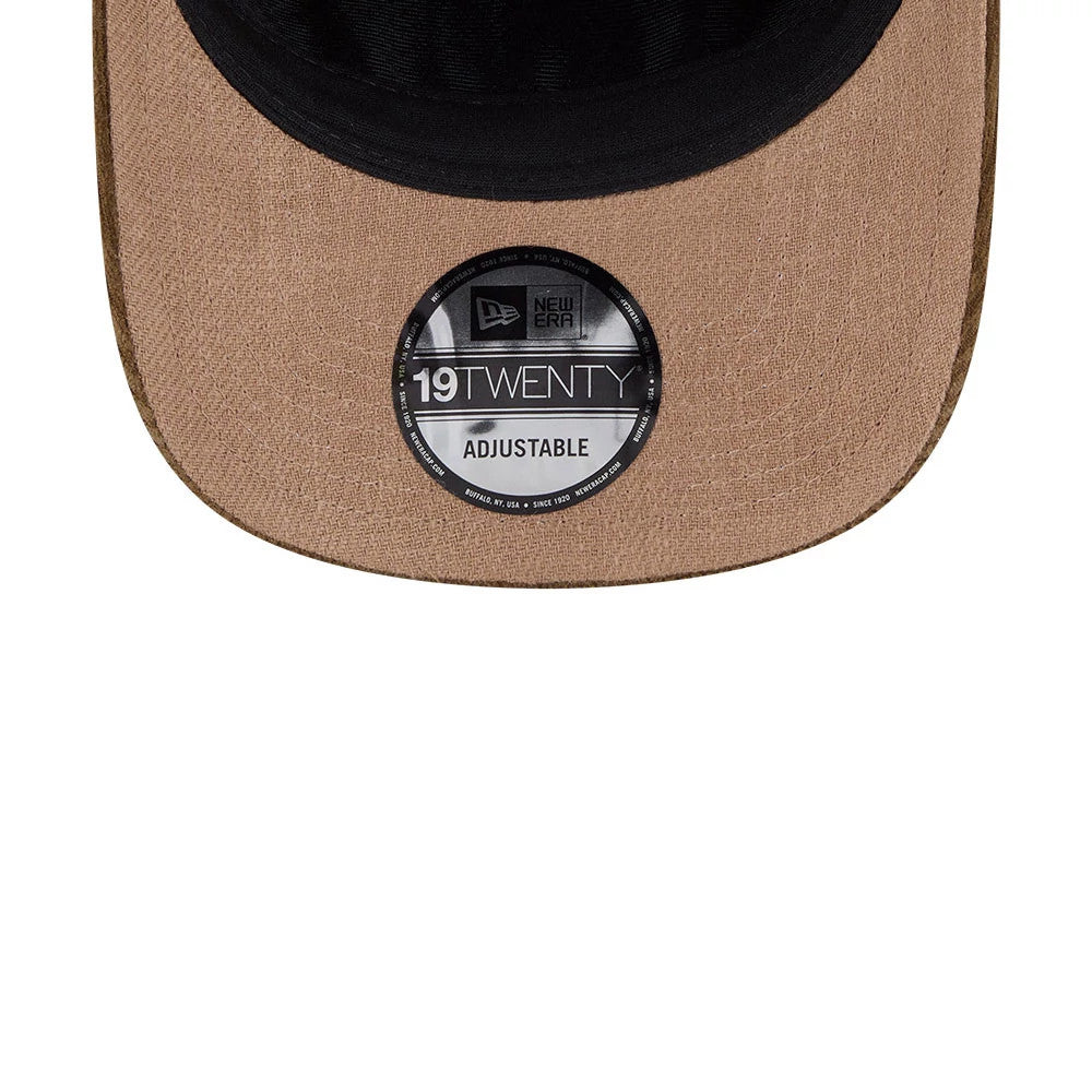 New York Giants NFL Utility Linen Open Brown New Era 19TWENTY Adjustable Cap, inside view showing the black sweatband and tan undervisor with a 19TWENTY size sticker affixed at the centre.