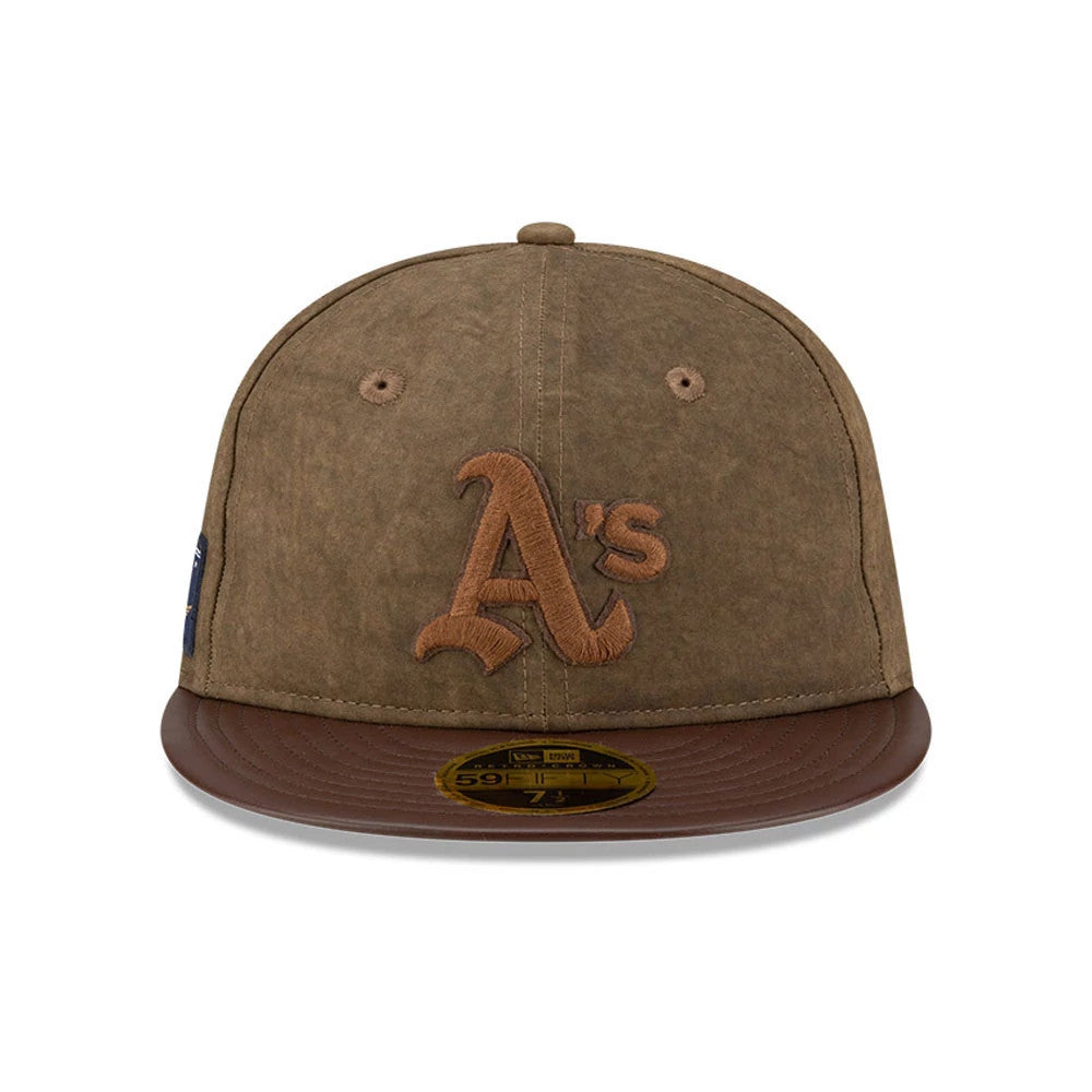 Athletics MLB Open Brown Retro Crown New Era 59FIFTY Fitted Cap, front view showing raised brown A's embroidery on the front panel, brown flat visor with a gold 59FIFTY size sticker, and dark brown undervisor.