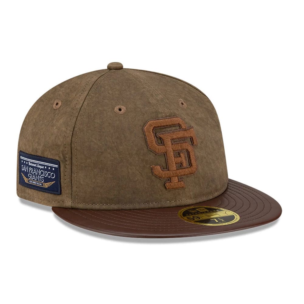 San Francisco Giants MLB Open Brown Retro Crown New Era 59FIFTY Fitted Cap, three-quarter view showing the brown embroidered front logo, navy team patch on the side, dark brown visor and a gold 59FIFTY size sticker.