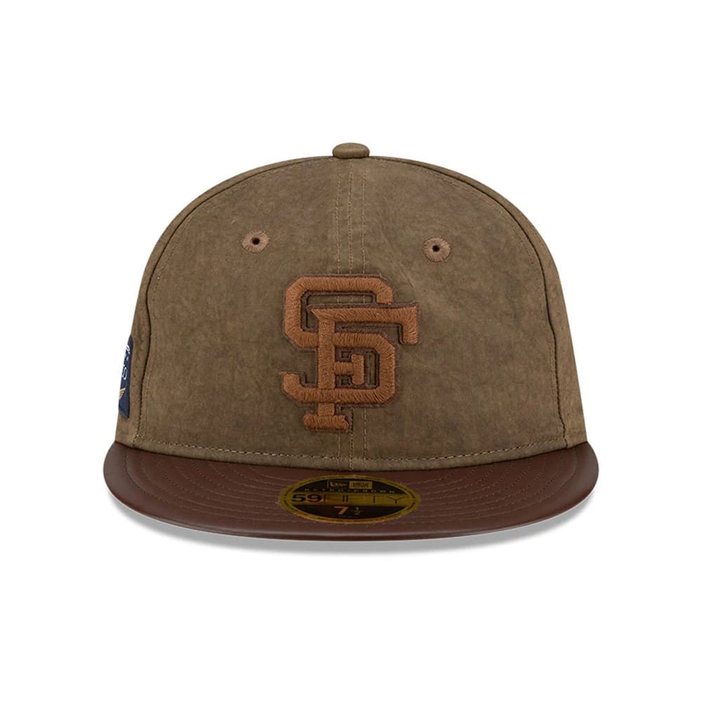 San Francisco Giants MLB Open Brown Retro Crown New Era 59FIFTY Fitted Cap, front view showing the raised brown embroidered SF logo on the front panel, brown flat visor with a gold 59FIFTY size sticker, eyelets and a top button.