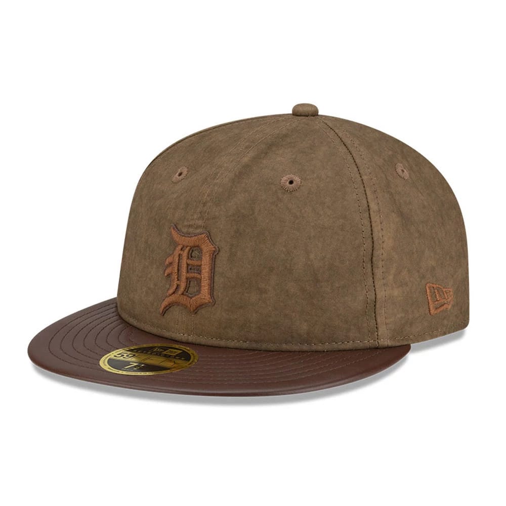 Detroit Tigers MLB Open Brown Retro Crown New Era 59FIFTY Fitted Cap, three-quarter view showing a brown embroidered D logo on the front panel, with a dark brown flat visor and a gold 59FIFTY size sticker.