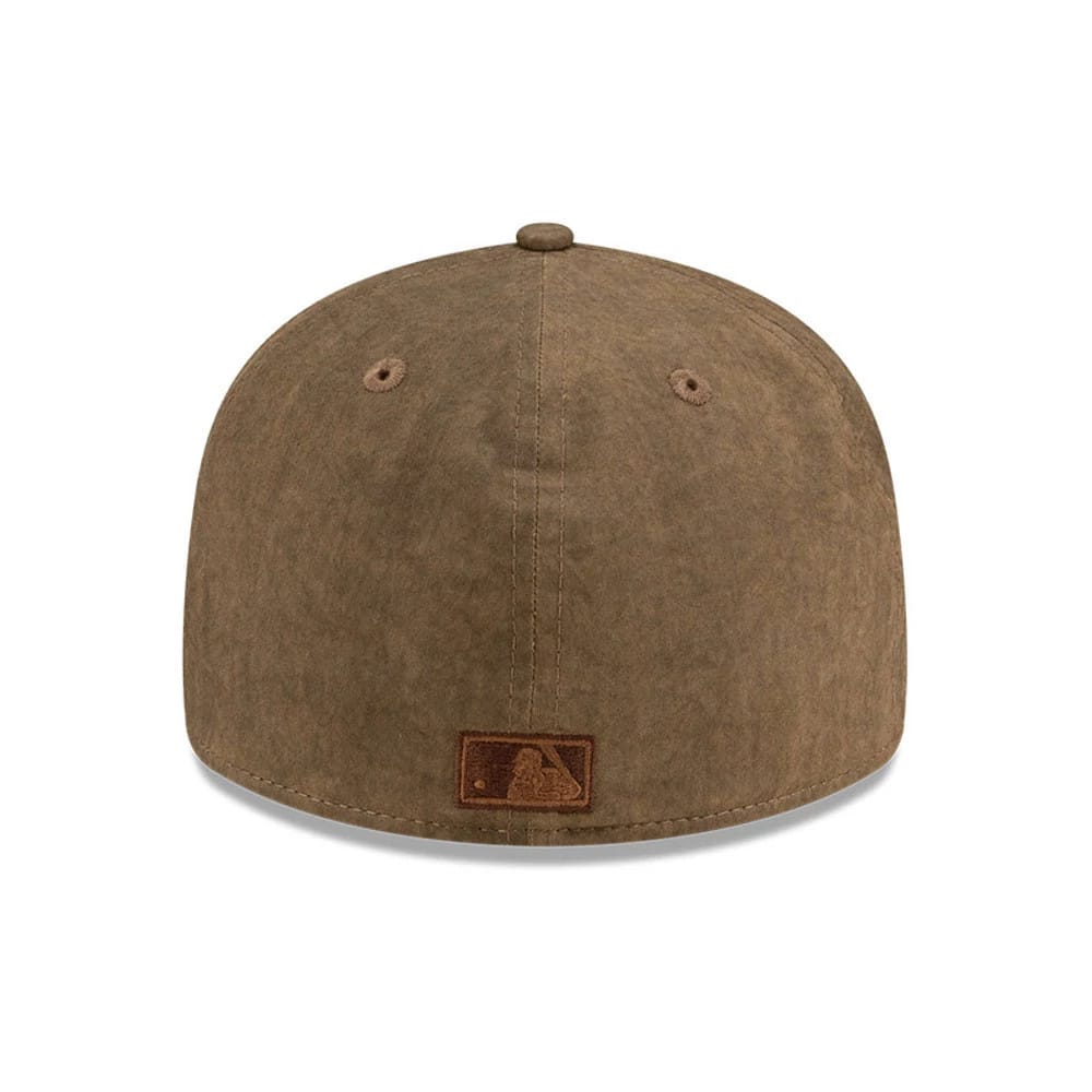 Chicago Cubs MLB Open Brown Retro Crown New Era 59FIFTY Fitted Cap, rear view showing the brown embroidered MLB Batterman logo at the centre of the back panels on a soft brown unstructured crown.