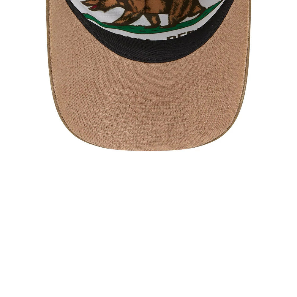LA Dodgers MLB Utility Linen Open Brown New Era 9TWENTY A-Frame Adjustable Cap, close-up showing the brown curved visor with a black undervisor and part of the front panel's California state flag bear graphic.