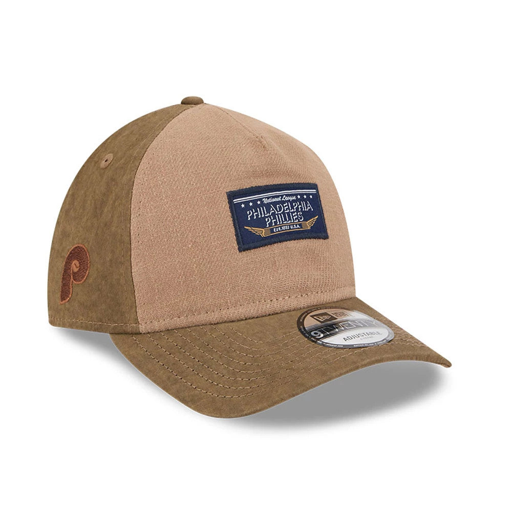 Pictured is this MLB Utility Linen Philadelphia Phillies 9TWENTY A-Frame cap in open brown. 1