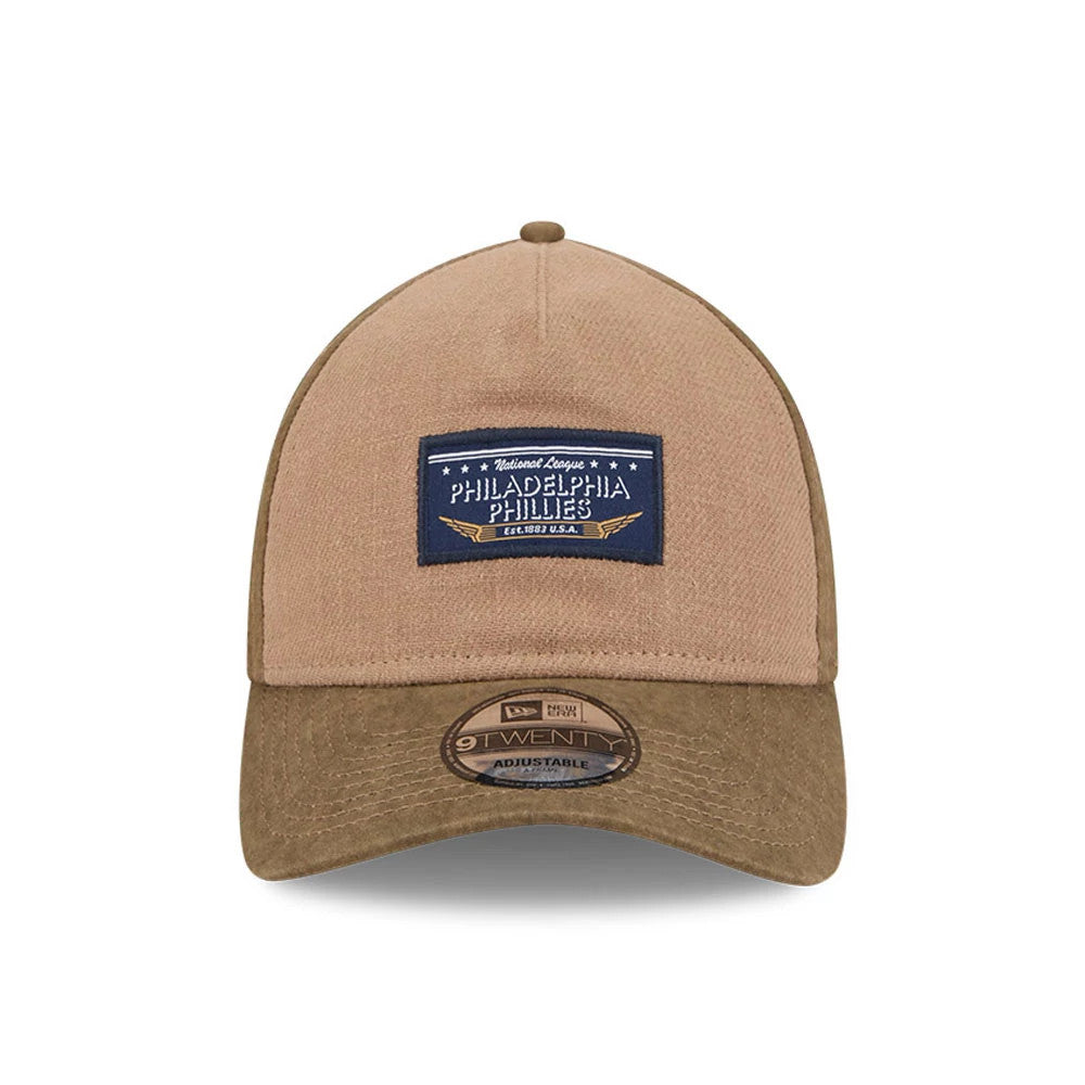 Pictured is this MLB Utility Linen Philadelphia Phillies 9TWENTY A-Frame cap in open brown. 2
