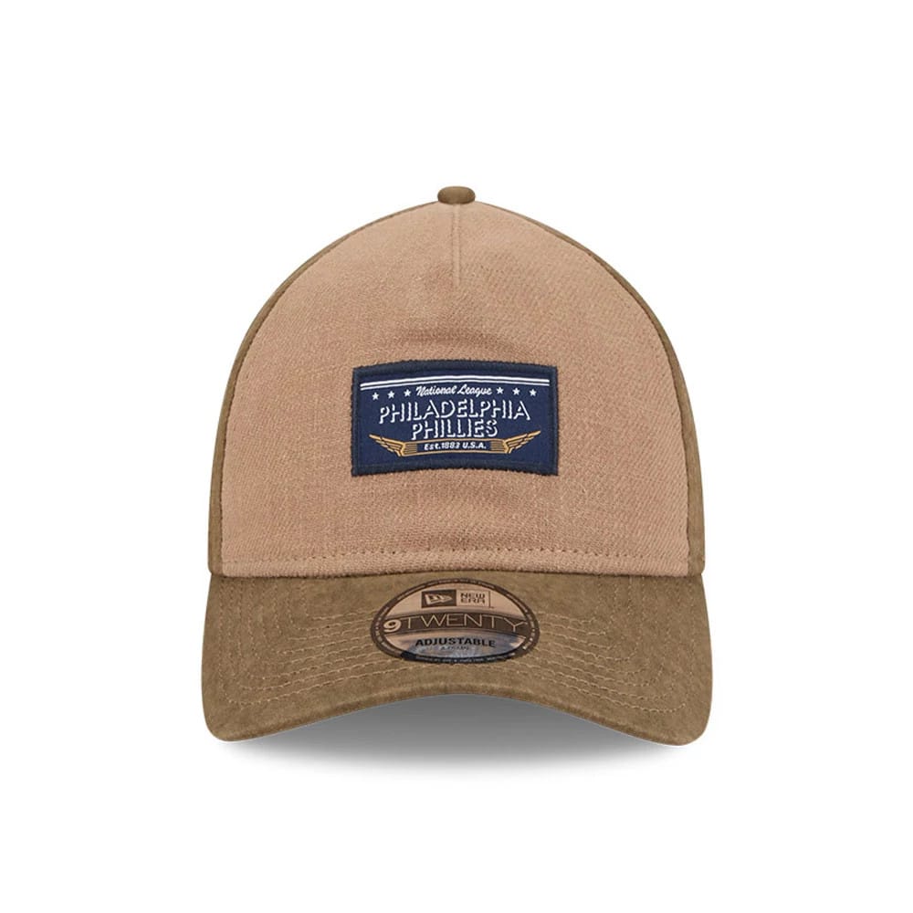 Pictured is this MLB Utility Linen Philadelphia Phillies 9TWENTY A-Frame cap in open brown. 2