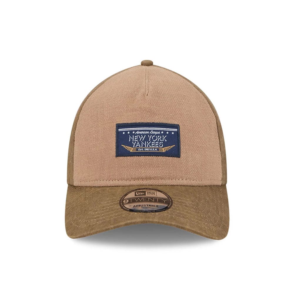 New York Yankees MLB Open Brown New Era 9TWENTY A-Frame Adjustable Cap, front view showing a navy patch with white embroidered lettering on the structured tan crown, brown curved visor and 9TWENTY size sticker.