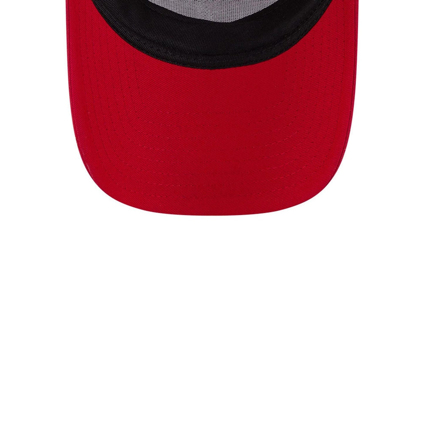 A Christmas Story Red New Era 9FORTY A-Frame Trucker Adjustable Cap, inside view showing a black sweatband, black mesh at the crown and a vivid red undervisor contrasting with the structured design.