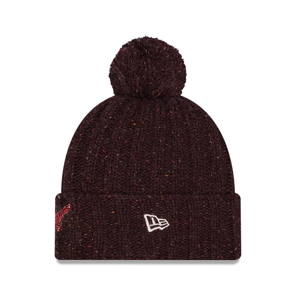 New Era A Christmas Story Open Brown Cuff knit Beanie Hat, front view showing the embroidered New Era flag logo in white on the cuff and a pom-pom on top, with a rich brown knitted texture.
