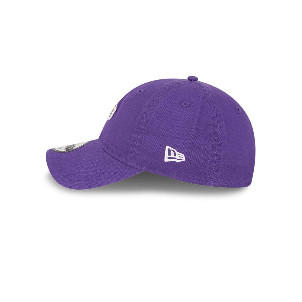 LA Lakers NBA All Star Game 2026 Purple New Era 9TWENTY Adjustable Cap, side view showing the white embroidered New Era flag logo on the left side, with a purple unstructured crown and curved visor featuring a size sticker.