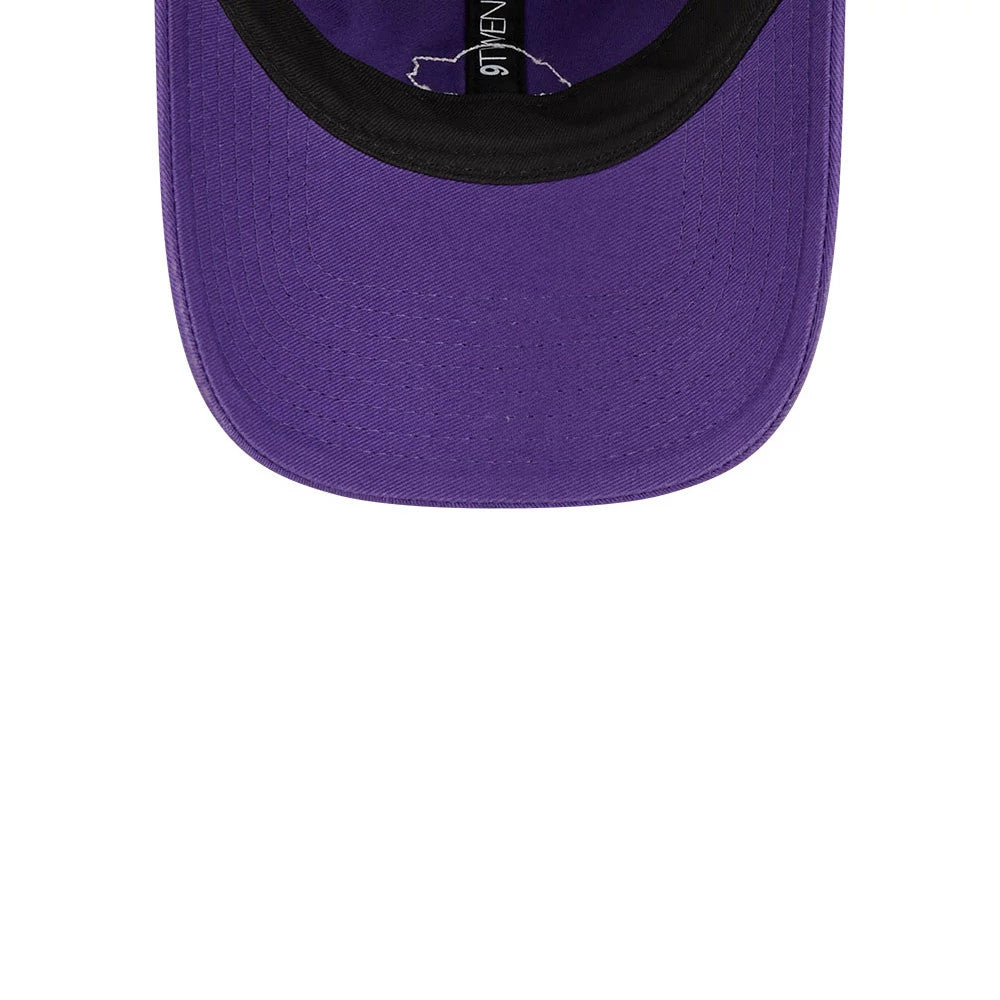 LA Lakers NBA All Star Game 2026 Purple New Era 9TWENTY Adjustable Cap, inside view showing the black sweatband and the purple undervisor, with the taping featuring New Era branding.