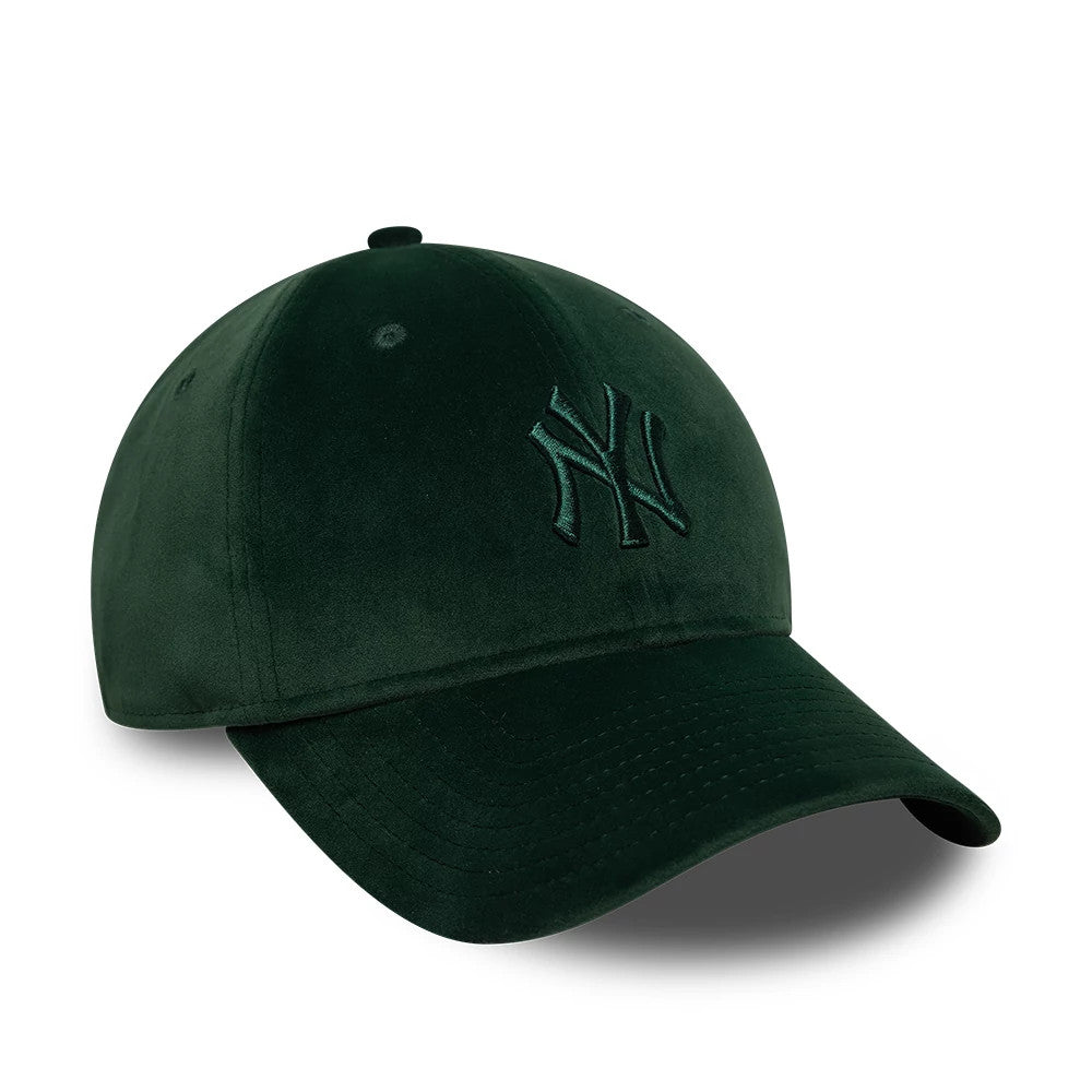 New York Yankees MLB Velour Dark Green New Era 9TWENTY Bow Back Adjustable Cap, three-quarter view showing the raised dark green NY embroidery on the front panel and a curved visor, with a dark green top button and eyelets.