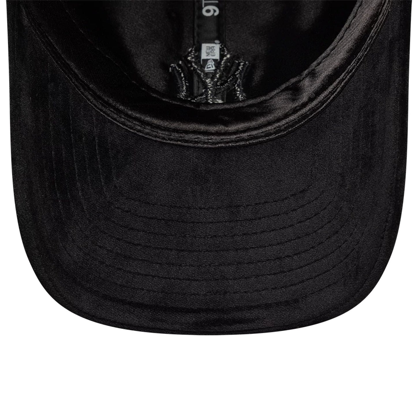 New York Yankees MLB Velour Black New Era 9TWENTY Bow Back Adjustable Cap, inside view showing the black undervisor and black taping with New Era branding, highlighting the velour texture and adjustable strap.