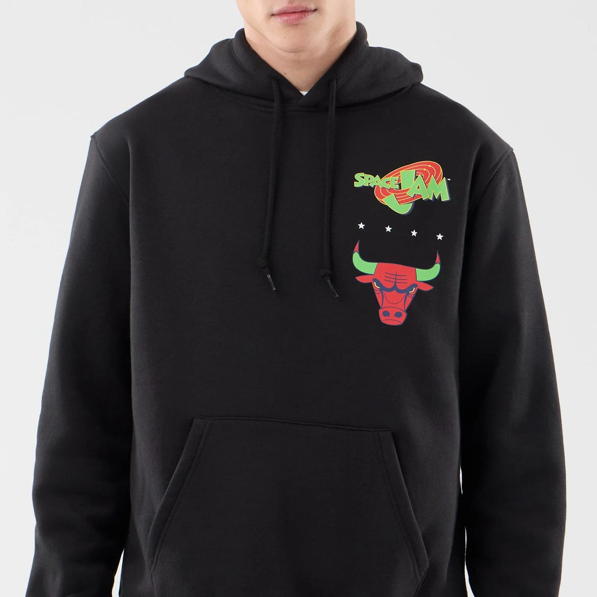 New Era Chicago Bulls Space Jam 2 X NBA Black Pullover Hoodie, front view featuring a printed Space Jam logo and a red Chicago Bulls logo on the chest, with stars above, and a front kangaroo pocket below.