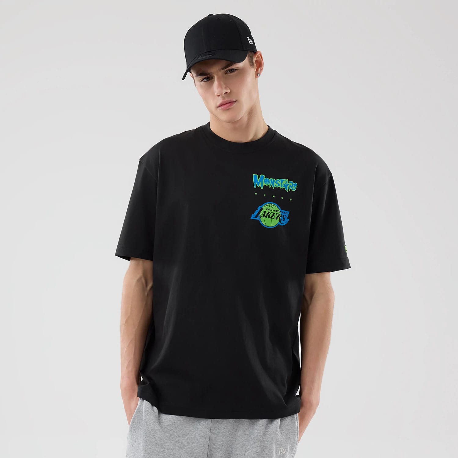 The model is wearing this Space Jam 2 X NBA LA Lakers T-Shirt in black. 1