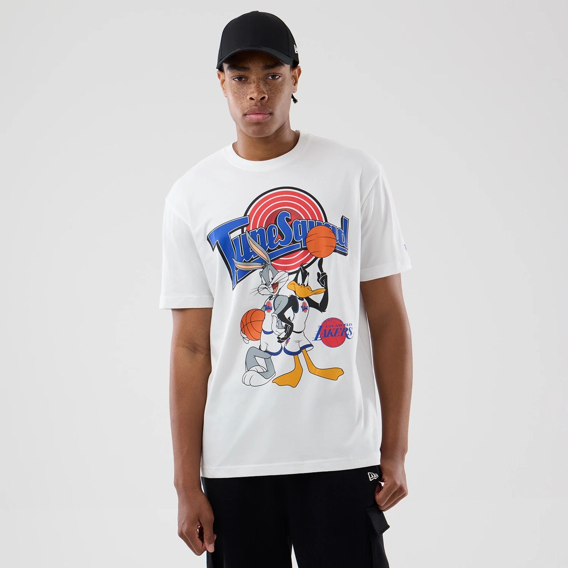 The model is wearing this Space Jam 2 X NBA LA Lakers T-Shirt in white. 1