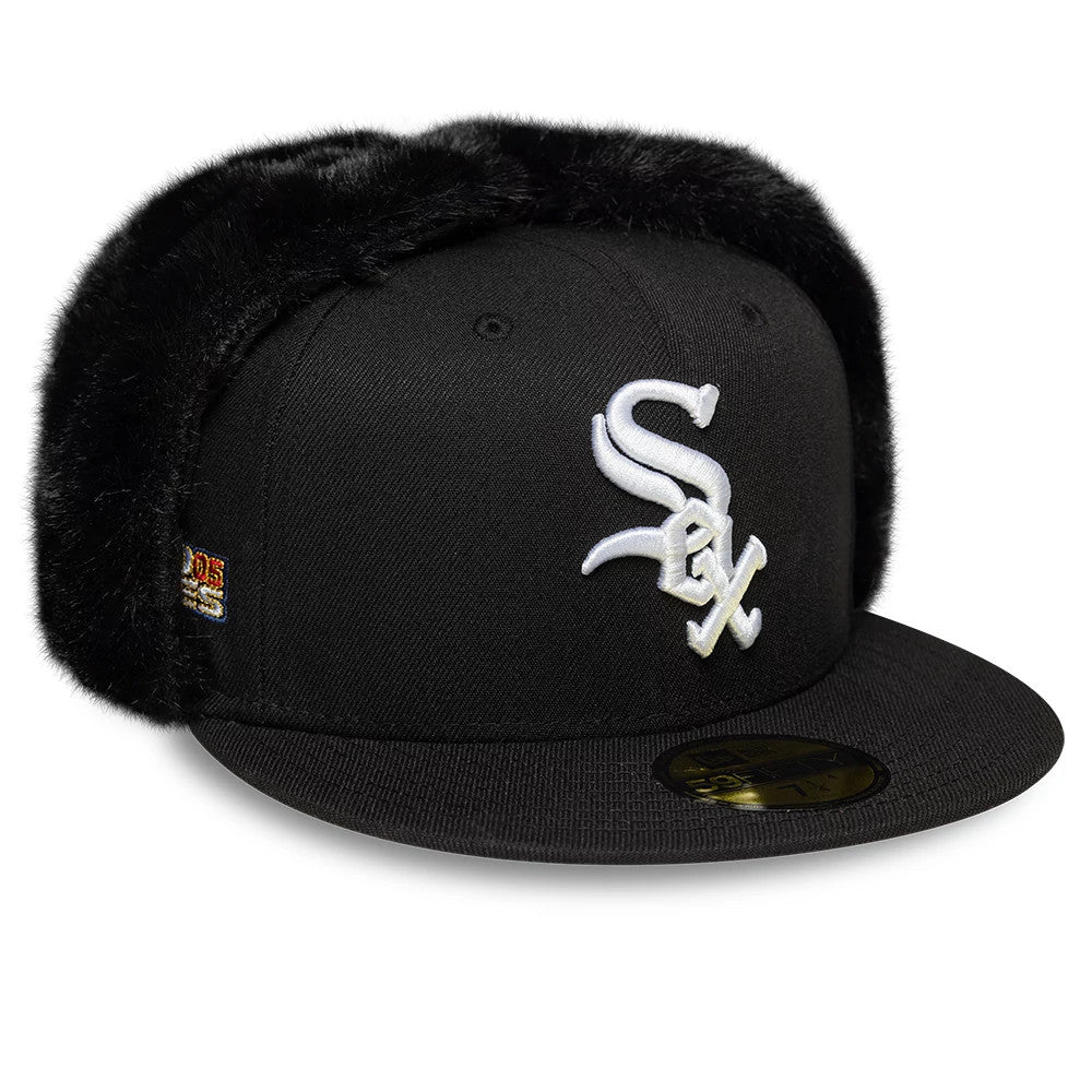 Chicago White Sox MLB World Series Black Dogear New Era 59FIFTY Fitted Cap, three-quarter view showing white embroidered Sox logo on the front panel, black visor with gold 59FIFTY size sticker, and fluffy black ear flaps.