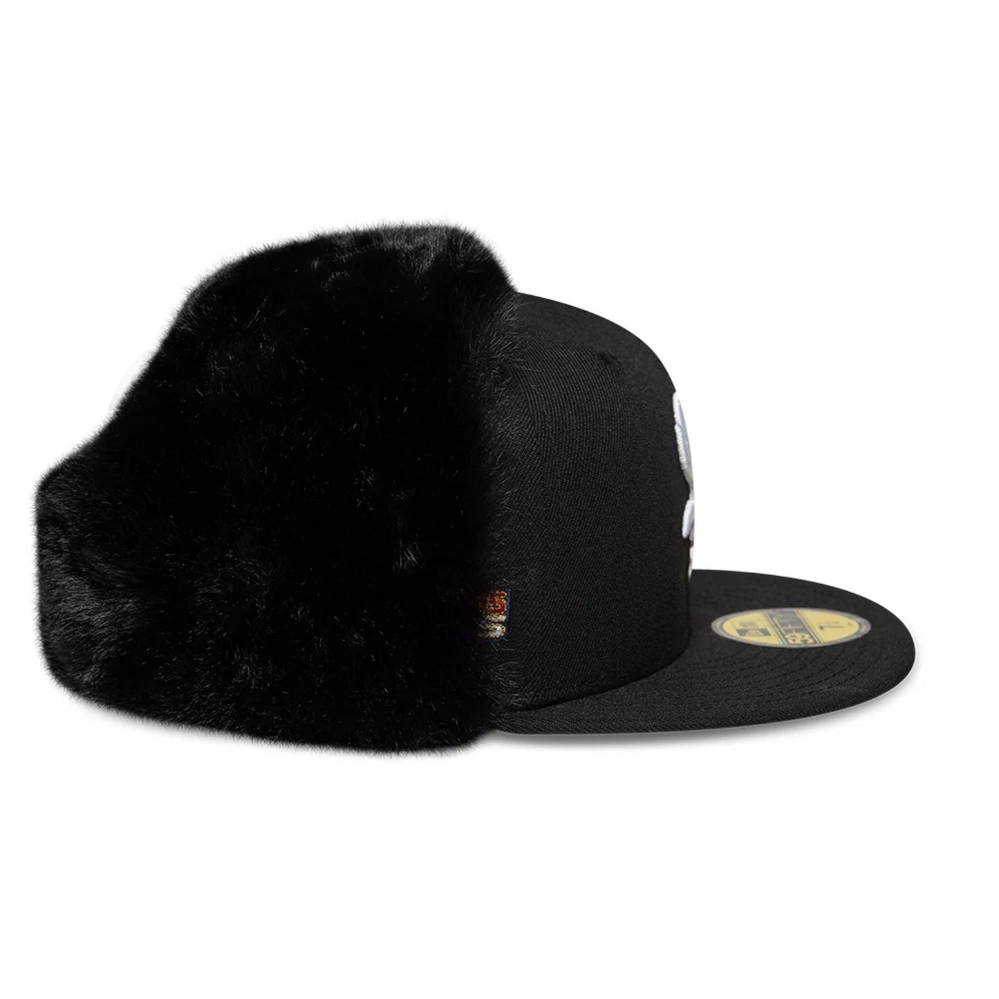 Chicago White Sox MLB World Series Black Dogear New Era 59FIFTY Fitted Cap, side view showing the white embroidered team logo on the front panel, with black fur dogears and a gold 59FIFTY size sticker on the black flat visor.