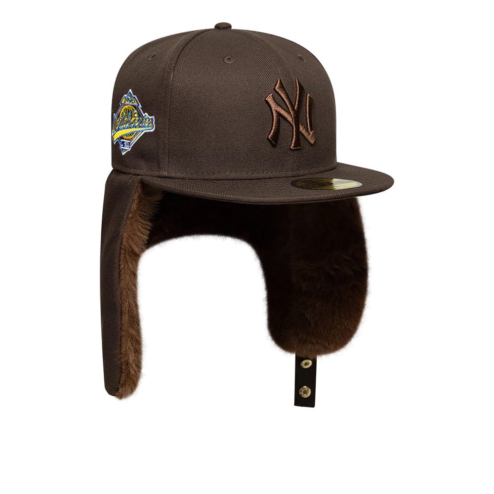Pictured is this MLB World Series New York Yankees Dogear 59FIFTY Fitted cap in dark brown. 2
