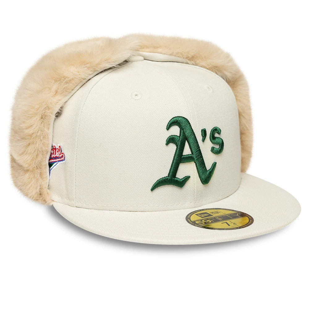 Pictured is this MLB World Series Athletics Dogear 59FIFTY Fitted cap in cream. 1