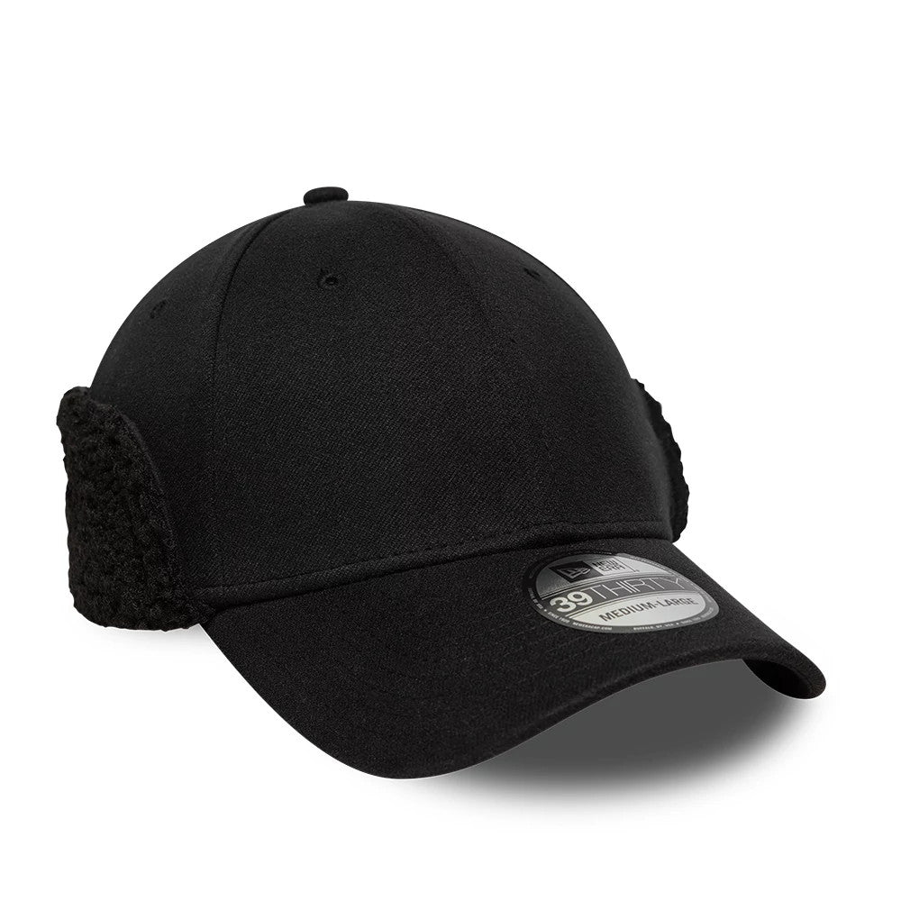New Era Black 39THIRTY Downflap Stretch Fit Cap, front three-quarter view showing a black textured downflap on the side and a structured black crown, with a black curved visor featuring a 39THIRTY size sticker.
