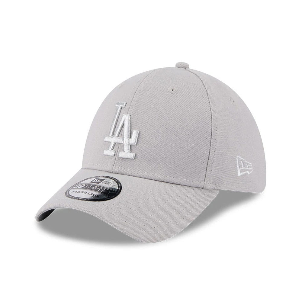 LA Dodgers MLB Metallic Grey New Era 39THIRTY Stretch Fit Cap, three-quarter view showing the raised white LA logo embroidered on the front panel, with a curved grey visor and 39THIRTY size sticker, New Era flag logo on the left side.