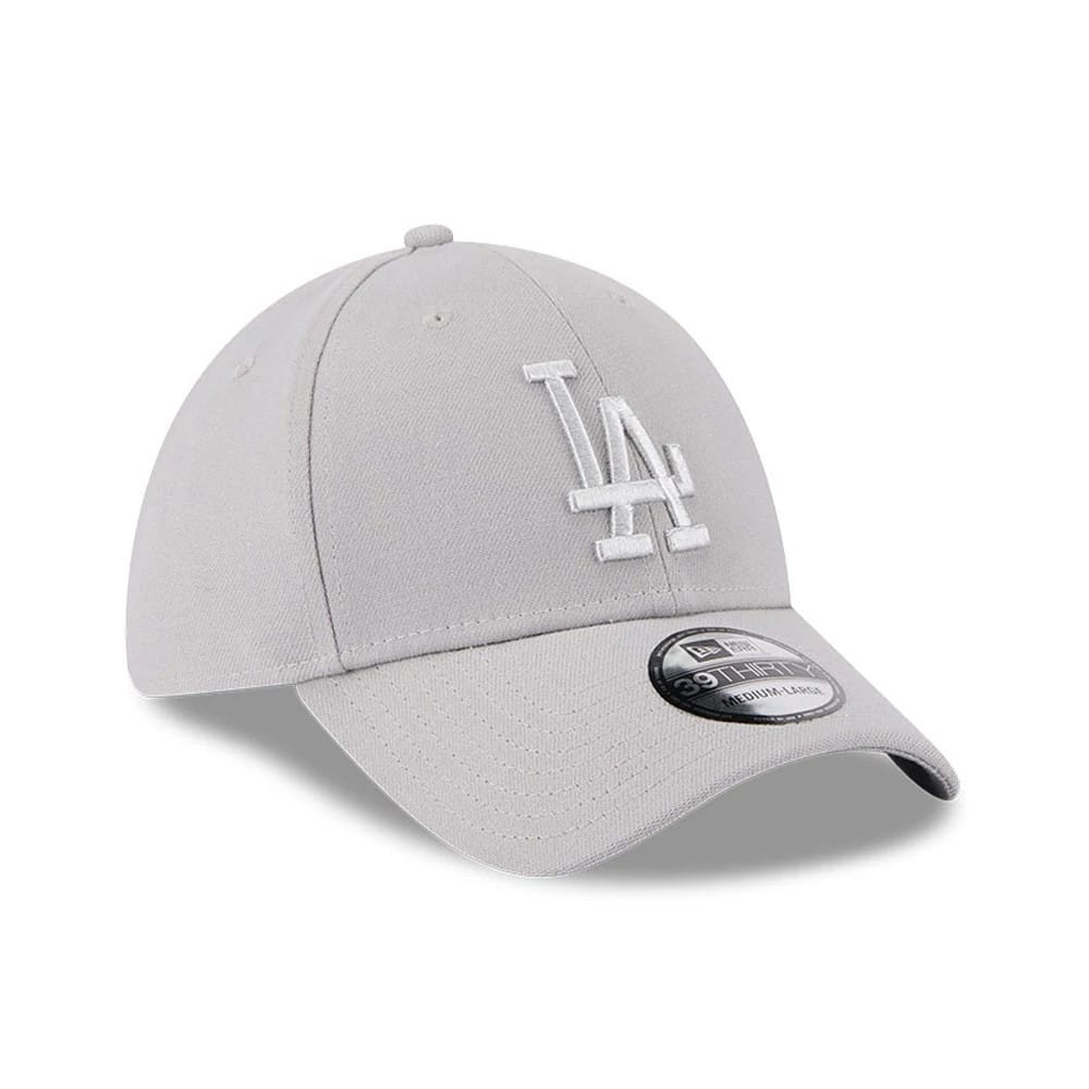 LA Dodgers MLB Metallic Grey New Era 39THIRTY Stretch Fit Cap, three-quarter view showing the white embroidered LA logo on the front panel, a bent grey visor, and a 39THIRTY size sticker on the top.
