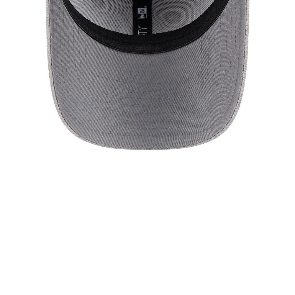 New York Yankees MLB Metallic Grey New Era 39THIRTY Stretch Fit Cap, inside view showing the grey undervisor with black inner taping and a sweatband, featuring the cap size label and logo on the taping.