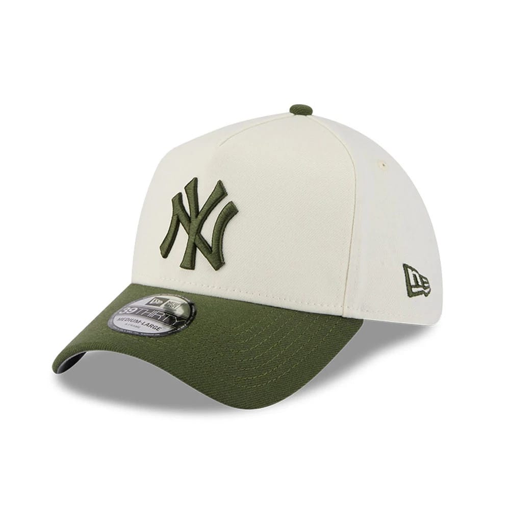 New York Yankees MLB Chrome Cream New Era 39THIRTY A-Frame Stretch Fit Cap, three-quarter view showing the dark green NY logo in raised embroidery on the front panel, with a matching green curved visor and a New Era flag logo on the left side.
