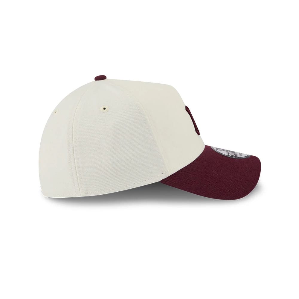 New York Yankees MLB Chrome Dark Red New Era 39THIRTY A-Frame Stretch Fit Cap, side view displaying the New Era flag logo embroidered on the left side, with a dark red curved visor and a light cream structured crown.