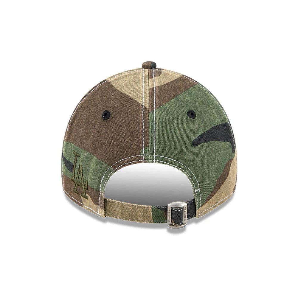 LA Dodgers MLB Washed Camo Open Green New Era 9TWENTY Adjustable Cap, rear view showing the LA logo in green embroidery on the left of the camo-printed panels and an adjustable fabric strap with a buckle.