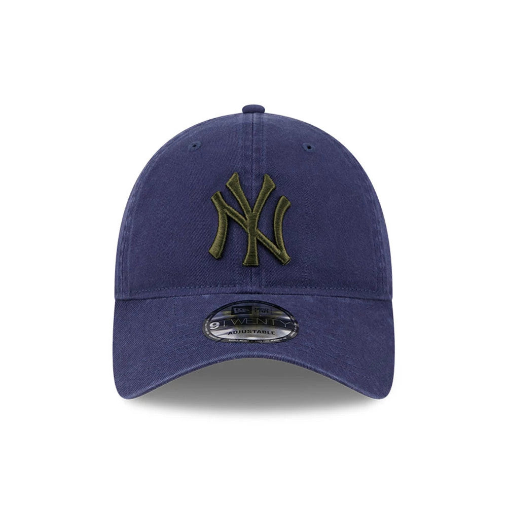 New York Yankees MLB Rifle Green Logo Navy New Era 9TWENTY Adjustable Cap, front view showing a raised rifle green embroidered NY logo on the structured navy crown, with a 9TWENTY size sticker on the curved visor.