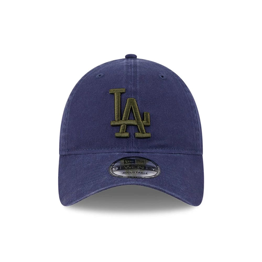 LA Dodgers MLB Rifle Green Logo Navy New Era 9TWENTY Adjustable Cap, front view showing a raised rifle green embroidered LA logo on the navy crown with matching eyelets and a curved visor, featuring a 9TWENTY size sticker.
