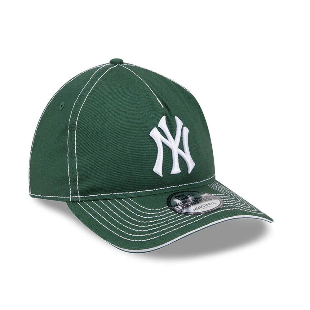 New York Yankees MLB Contrast Dark Green New Era 9TWENTY A-Frame Adjustable Cap, three-quarter view showing the white embroidered NY logo on the front panels, with contrasting white stitching on the curved visor and a 9TWENTY size sticker.